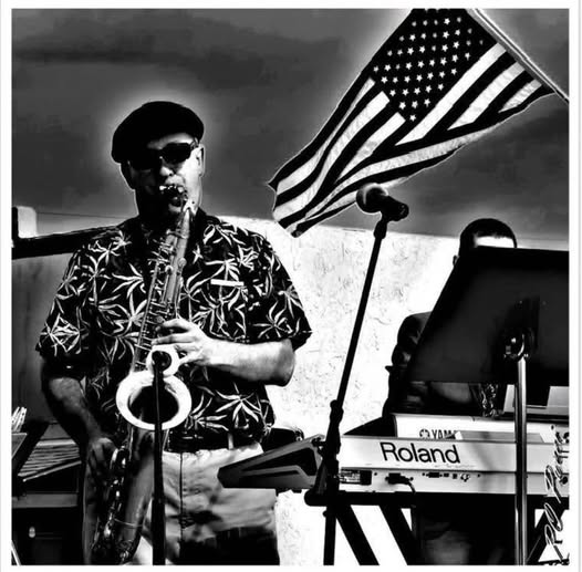 SAX PLAYER / A MUSIC SAINT IN LIL' TOWN AMERICA