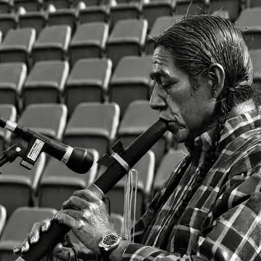 NATIVE FLUTE PLAYER