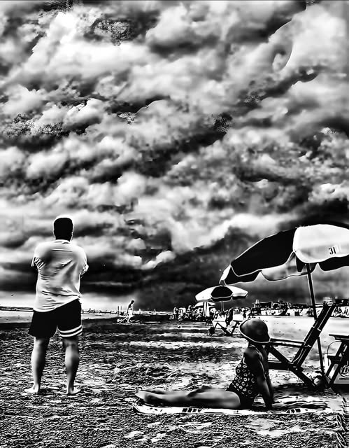 ON THE BEACH / WORRIED ABOUT THE WEATHER