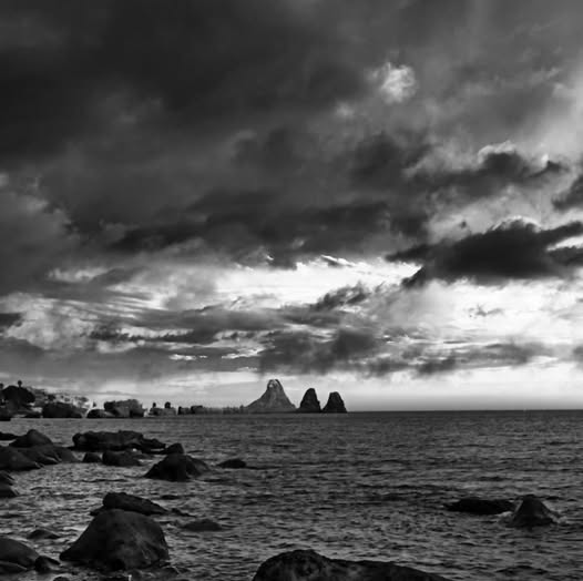 ULYSSES LEGENDARY “FARAGLIONI” IN THE DISTANCE