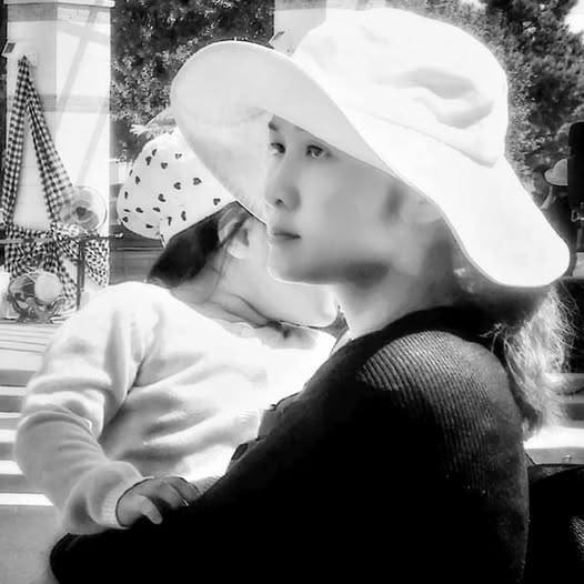 MOTHER WITH CHILD
