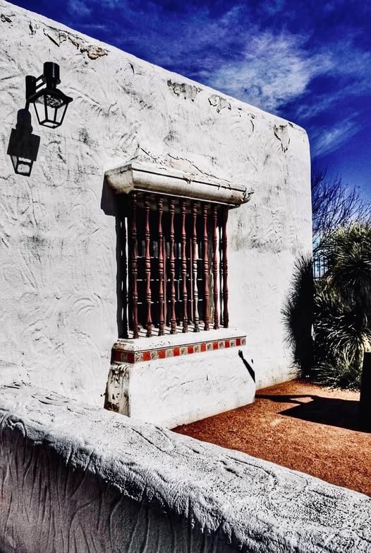 WINDOW BEYOND THE WALL
